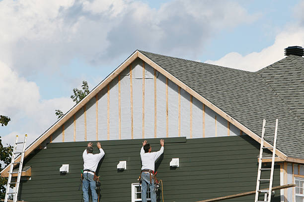 Professional Siding technician working in Easton, PA